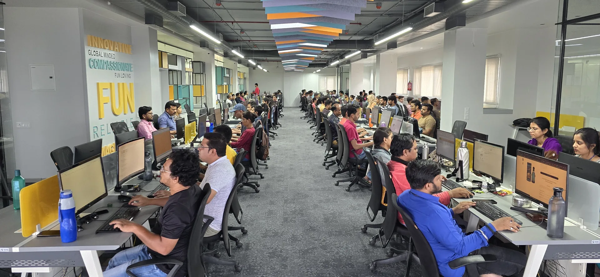 An open-plan operational work hall at StaffCloud's Gondia office